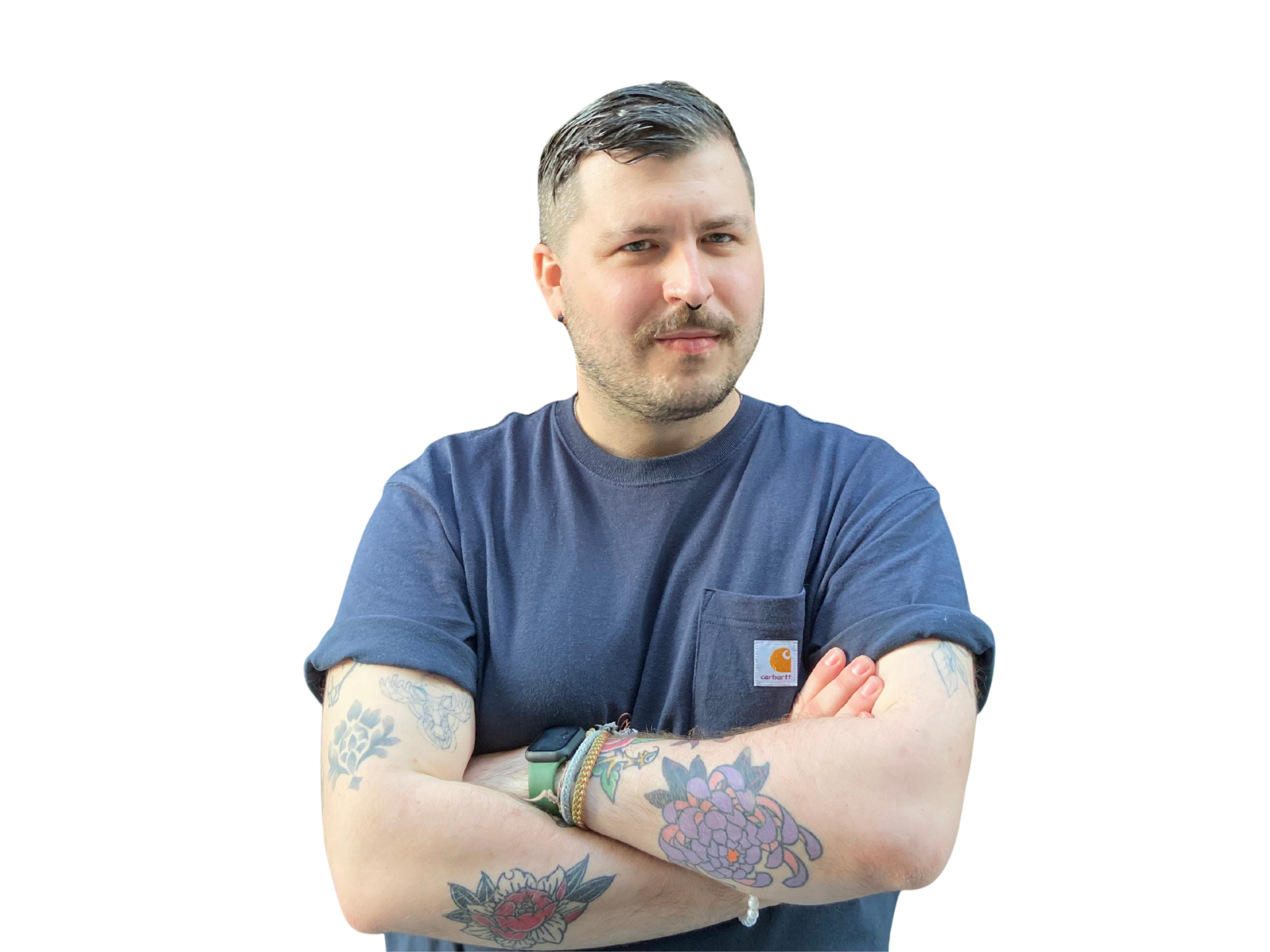 photo of male, in blue shirt, with arms crossed